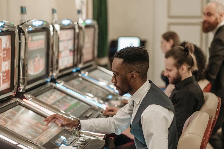 Energy Consumption and Material Waste Associated with Slot Machines